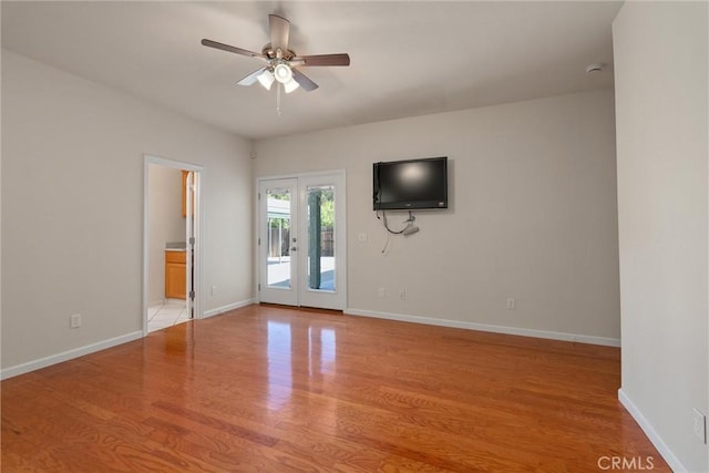 1095 Glenwood Ln, Willows, CA 95988 - unfurnished living room with light wood finished floors, ceiling fan, and baseboards