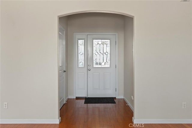1095 Glenwood Ln, Willows, CA 95988 - foyer featuring arched walkways, baseboards, and hardwood / wood-style flooring
