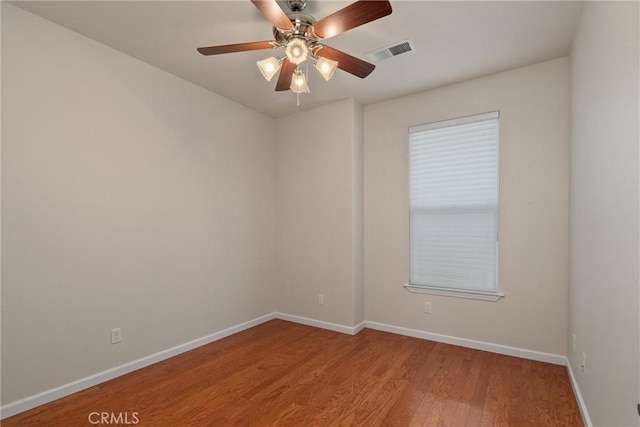 1095 Glenwood Ln, Willows, CA 95988 - unfurnished room with wood finished floors, baseboards, and ceiling fan