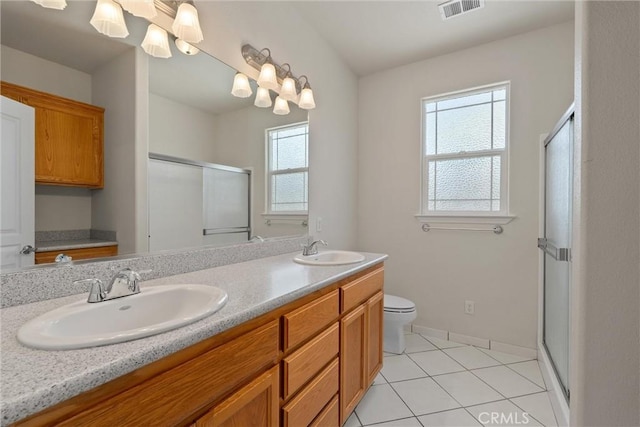 1095 Glenwood Ln, Willows, CA 95988 - full bath with a stall shower, plenty of natural light, double vanity, and toilet