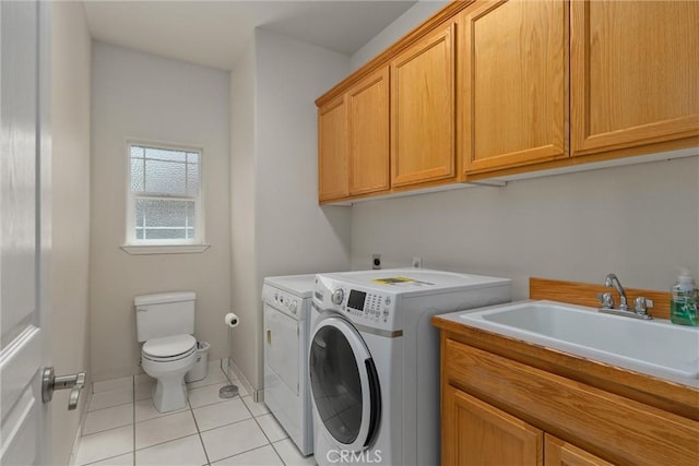 1095 Glenwood Ln, Willows, CA 95988 - washroom featuring washing machine and clothes dryer and light tile patterned floors