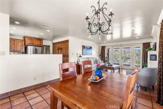 8830 Quail Springs Rd, Joshua Tree, CA 92252 - dining space with recessed lighting, a chandelier, french doors, and light tile patterned floors