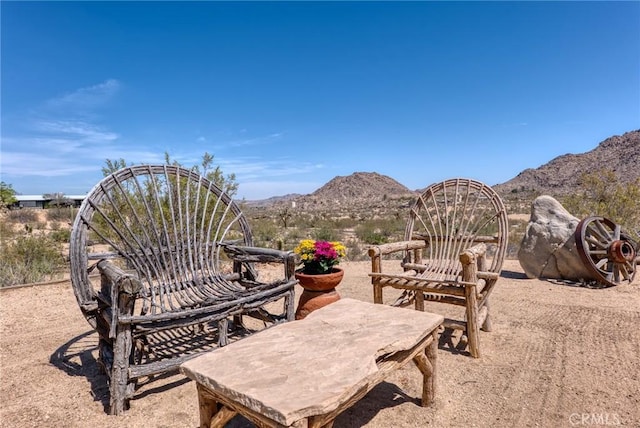 8830 Quail Springs Rd, Joshua Tree, CA 92252 - view of patio / terrace with a mountain view