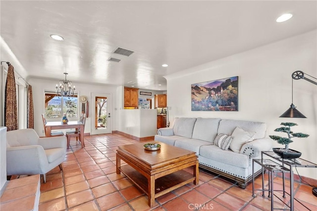 8830 Quail Springs Rd, Joshua Tree, CA 92252 - living room with recessed lighting, a chandelier, light tile patterned floors, and baseboards