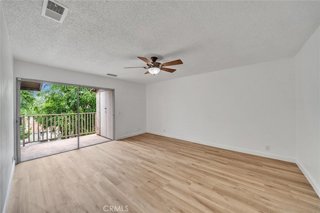 901 Golden Springs Dr Unit D13, Diamond Bar, CA 91765 - empty room featuring ceiling fan, light wood-type flooring, baseboards, and a textured ceiling
