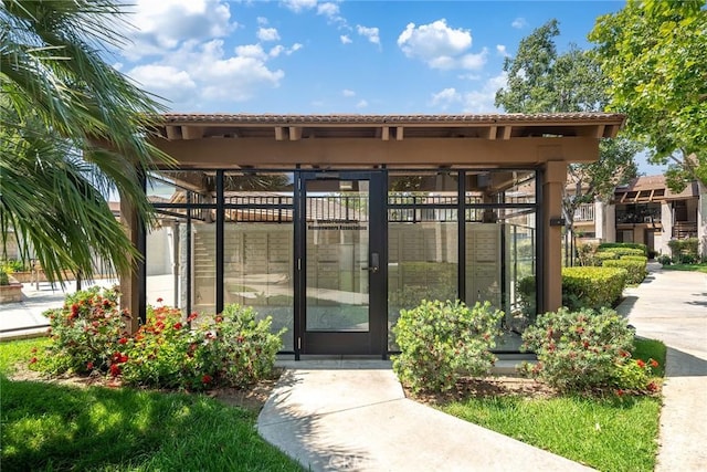 901 Golden Springs Dr Unit D13, Diamond Bar, CA 91765 - view of exterior entry featuring a tile roof and stucco siding