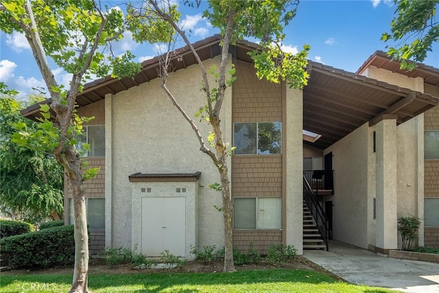 901 Golden Springs Dr Unit D13, Diamond Bar, CA 91765 - view of front of property with stairway and stucco siding