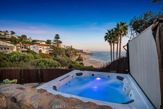 10 Camel Pt, Laguna Beach, CA 92651 - view of pool featuring a hot tub and a water view
