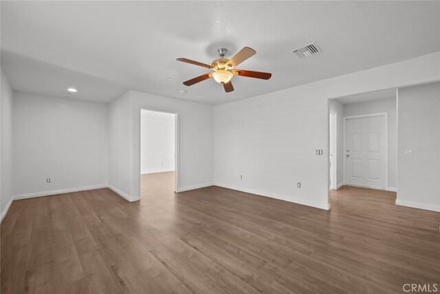 8225 W W Ave E4, Lancaster, CA 93536 - unfurnished room featuring baseboards, wood finished floors, a ceiling fan, and recessed lighting