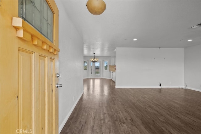 8225 W W Ave E4, Lancaster, CA 93536 - foyer entrance featuring dark wood-type flooring, a chandelier, baseboards, and recessed lighting