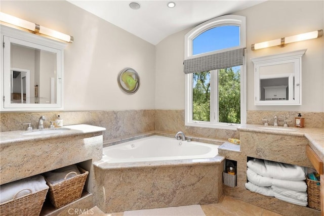 1761 Lemon Ter, North Tustin, CA 92705 - bathroom featuring vanity, a bath, vaulted ceiling, and tile patterned flooring