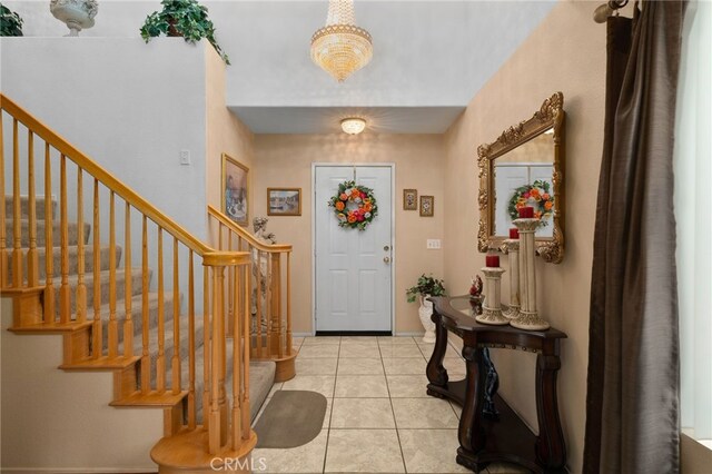 16290 Via Ultimo, Moreno Valley, CA 92551 - entryway featuring stairway and light tile patterned flooring