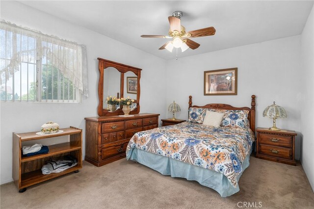 16290 Via Ultimo, Moreno Valley, CA 92551 - carpeted bedroom featuring a ceiling fan