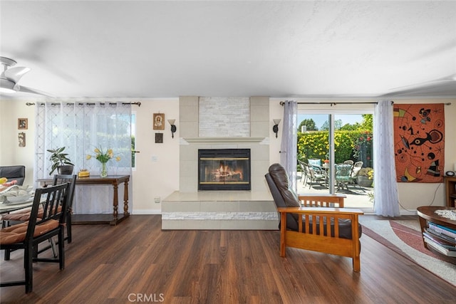 4435 Via Del Prado, Yorba Linda, CA 92886 - living room with wood finished floors, a tiled fireplace, and plenty of natural light