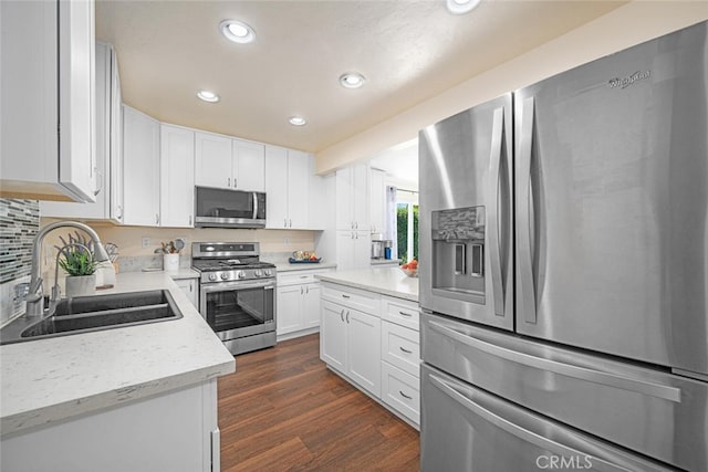 4435 Via Del Prado, Yorba Linda, CA 92886 - kitchen with stainless steel appliances, recessed lighting, white cabinets, and dark wood-style floors