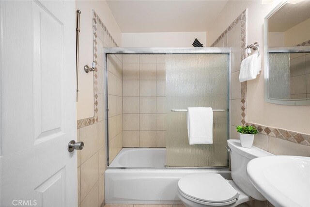 4435 Via Del Prado, Yorba Linda, CA 92886 - bathroom featuring tile walls and bath / shower combo with glass door
