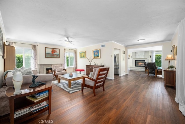 4435 Via Del Prado, Yorba Linda, CA 92886 - living room with a glass covered fireplace, dark wood-style floors, plenty of natural light, and ceiling fan