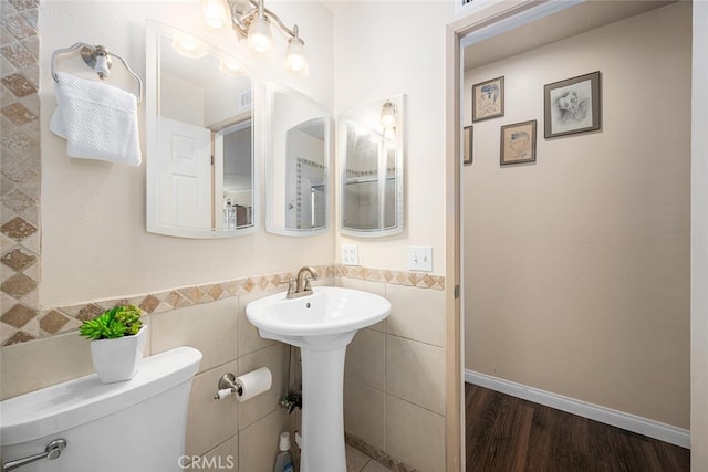 4435 Via Del Prado, Yorba Linda, CA 92886 - half bathroom with tile walls, wood finished floors, and wainscoting