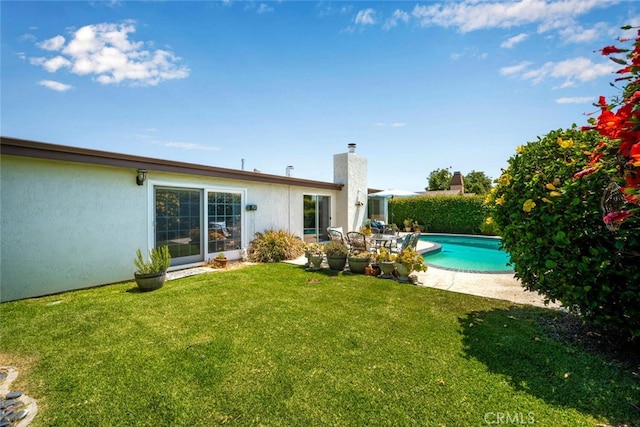 4435 Via Del Prado, Yorba Linda, CA 92886 - rear view of house featuring a lawn and stucco siding
