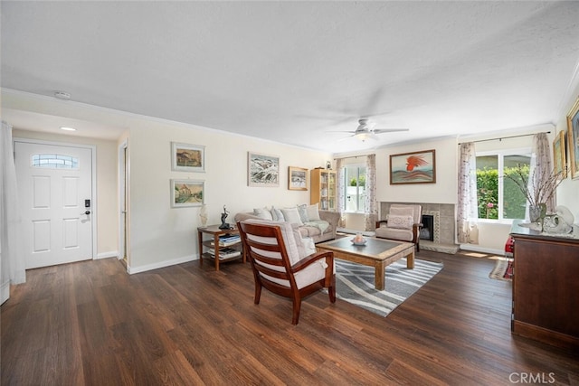 4435 Via Del Prado, Yorba Linda, CA 92886 - living room featuring dark wood-style floors, ceiling fan, a fireplace, and ornamental molding
