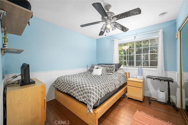 4435 Via Del Prado, Yorba Linda, CA 92886 - bedroom featuring a wainscoted wall, wood finished floors, and a ceiling fan