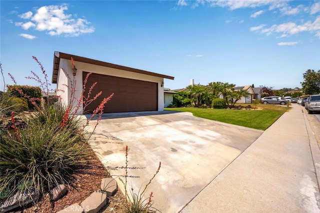4435 Via Del Prado, Yorba Linda, CA 92886 - view of front facade featuring a garage, a front lawn, stucco siding, and concrete driveway