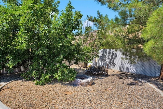 6786 Middleton Ave, Hesperia, CA 92345 - view of yard featuring an outdoor fire pit