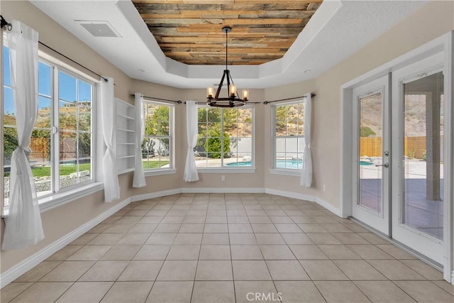 6786 Middleton Ave, Hesperia, CA 92345 - unfurnished sunroom with a chandelier, plenty of natural light, and french doors