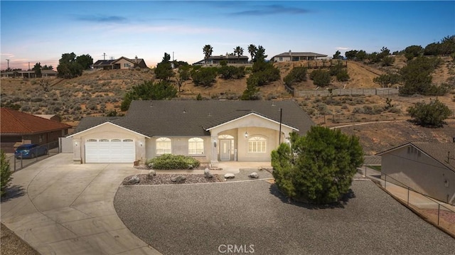 6786 Middleton Ave, Hesperia, CA 92345 - ranch-style house featuring concrete driveway, an attached garage, and stucco siding