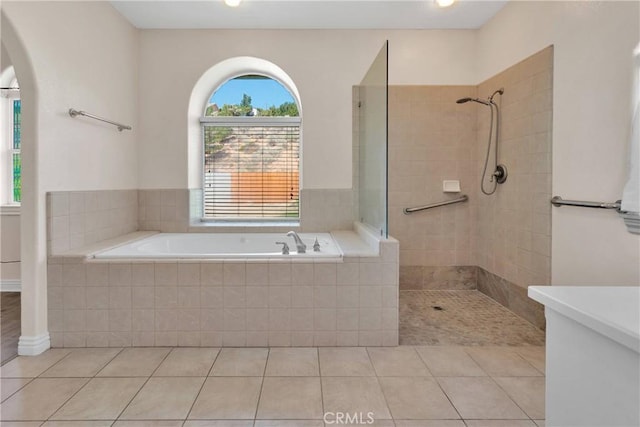 6786 Middleton Ave, Hesperia, CA 92345 - bathroom featuring a garden tub, tile patterned floors, walk in shower, and vanity