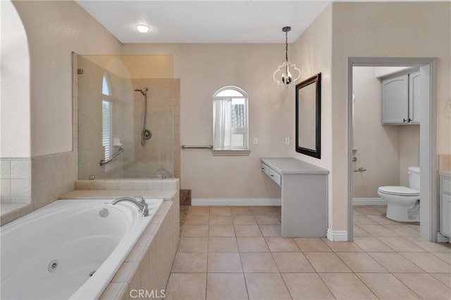 6786 Middleton Ave, Hesperia, CA 92345 - bathroom with a tub with jets, vanity, tile patterned flooring, and tiled shower