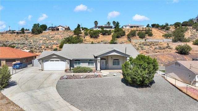6786 Middleton Ave, Hesperia, CA 92345 - ranch-style house with driveway, a garage, and stucco siding
