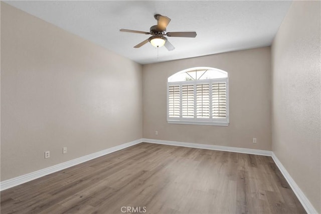 6786 Middleton Ave, Hesperia, CA 92345 - unfurnished room featuring wood finished floors and ceiling fan