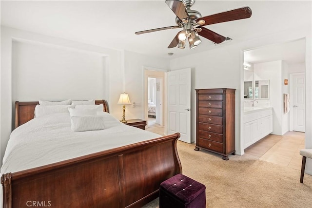 26974 Colonial Ln, Valencia, CA 91355 - bedroom featuring light colored carpet, ensuite bathroom, and a ceiling fan