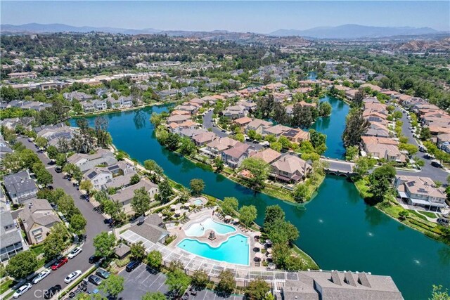 26974 Colonial Ln, Valencia, CA 91355 - aerial view of property's location with nearby suburban area and a water and mountain view