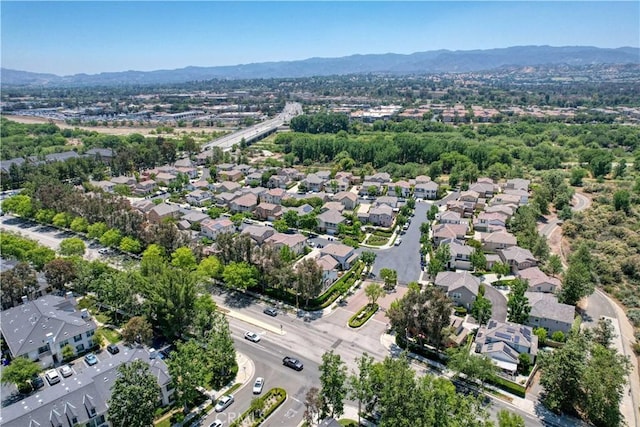 26974 Colonial Ln, Valencia, CA 91355 - aerial view of property's location with a mountainous background and nearby suburban area
