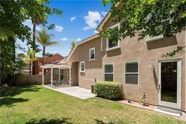 26974 Colonial Ln, Valencia, CA 91355 - back of house with stucco siding, a patio, and a pergola