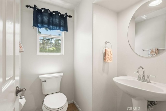 26974 Colonial Ln, Valencia, CA 91355 - half bathroom featuring toilet and a sink
