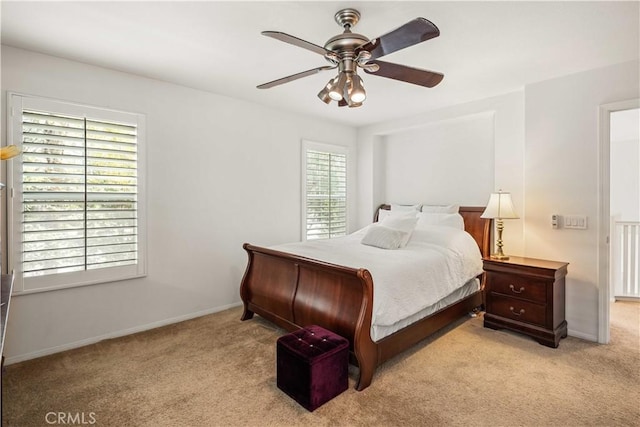 26974 Colonial Ln, Valencia, CA 91355 - bedroom with light carpet, baseboards, and a ceiling fan