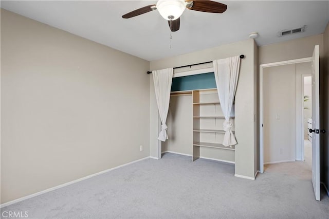 25839 Cypress St Unit B, Lomita, CA 90717 - unfurnished bedroom with carpet flooring, baseboards, a closet, and a ceiling fan