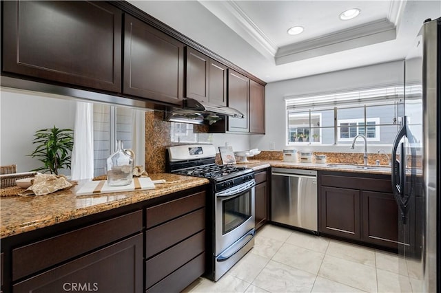 25839 Cypress St Unit B, Lomita, CA 90717 - kitchen featuring stainless steel appliances, a sink, a raised ceiling, stone countertops, and ornamental molding