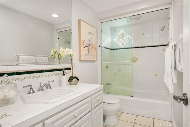 13061 Rosalind Dr, North Tustin, CA 92705 - full bath featuring toilet, vanity, tile patterned flooring, and bathing tub / shower combination