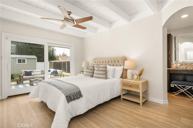 13061 Rosalind Dr, North Tustin, CA 92705 - bedroom featuring access to exterior, arched walkways, beamed ceiling, light wood-style floors, and ceiling fan