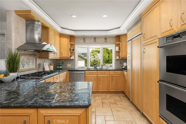 13061 Rosalind Dr, North Tustin, CA 92705 - kitchen featuring open shelves, wall chimney exhaust hood, appliances with stainless steel finishes, decorative backsplash, and stone tile floors