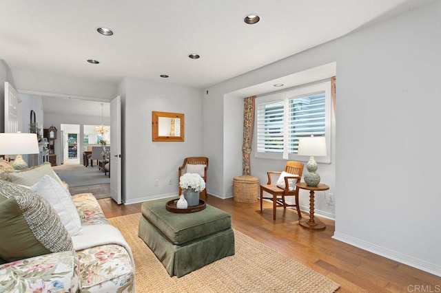 7414 Lantana, Carlsbad, CA 92011 - living room featuring plenty of natural light, light wood-style flooring, recessed lighting, and baseboards