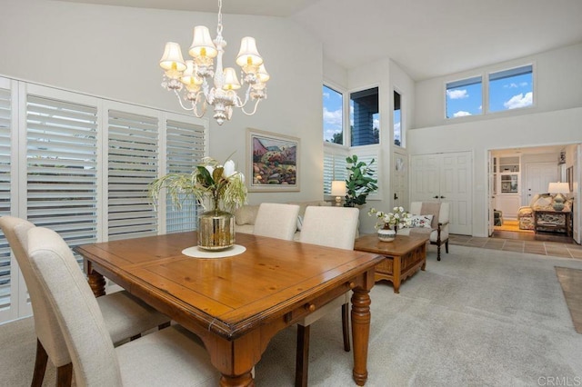7414 Lantana, Carlsbad, CA 92011 - dining area with high vaulted ceiling, a chandelier, and light carpet