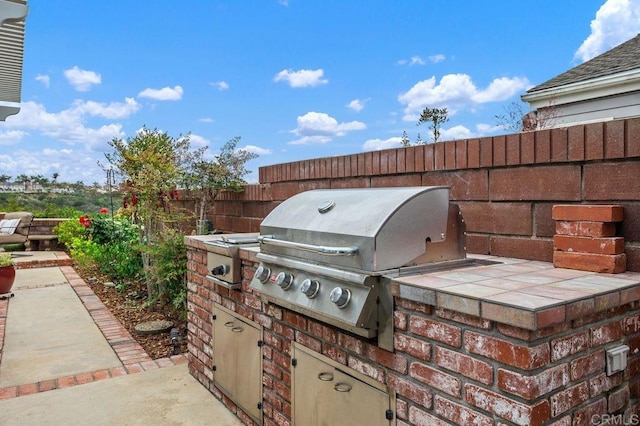 7414 Lantana, Carlsbad, CA 92011 - view of patio featuring exterior kitchen