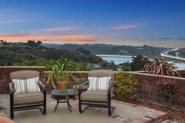 7414 Lantana, Carlsbad, CA 92011 - patio terrace at dusk with a patio and a water view