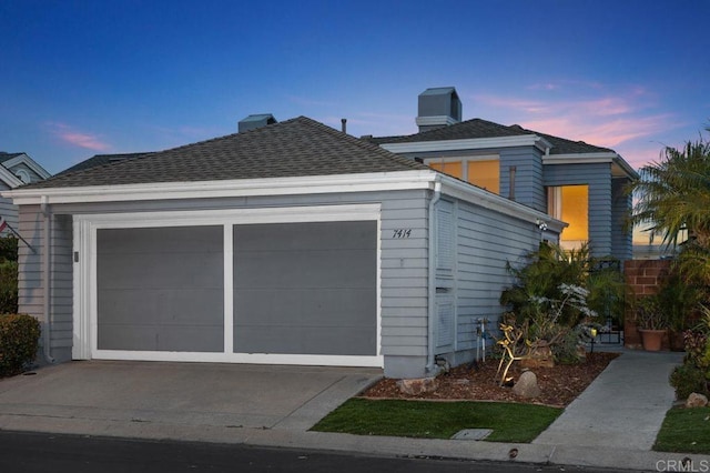 7414 Lantana, Carlsbad, CA 92011 - view of front facade featuring a chimney, an attached garage, and a shingled roof