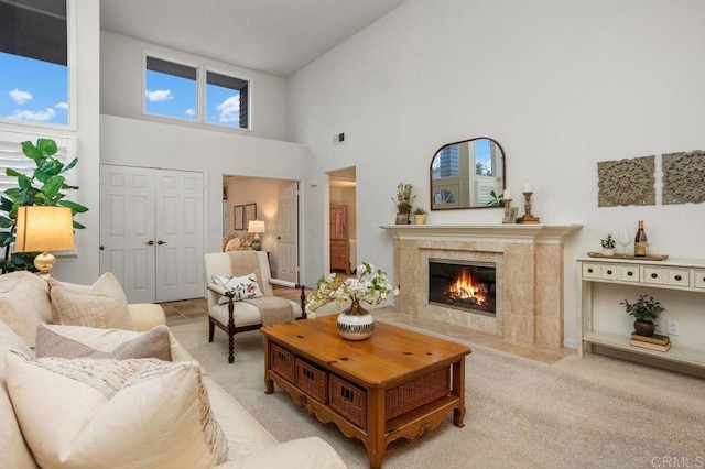 7414 Lantana, Carlsbad, CA 92011 - carpeted living room with a towering ceiling and a tile fireplace